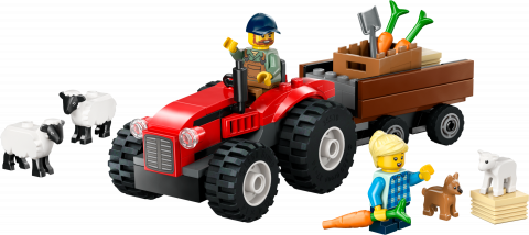 Rode tractor met aanhanger en schapen